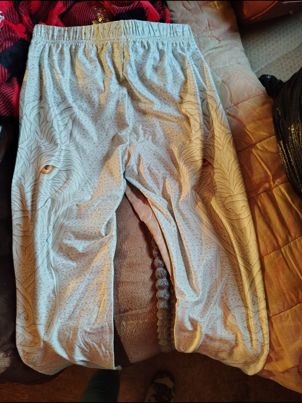Light Gray Athletic Pants with Subtle Wolf Graphic